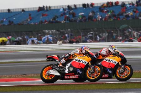 motogp 2011 silverstone results, Wet weather played havoc with the Silverstone grid but Honda s Casey Stoner and Andrea Dovizioso remained at the front