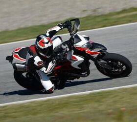 2013 ducati hypermotard 821 review motorcycle com, The SP enjoys being thrashed around a track especially if it s tight and twisty