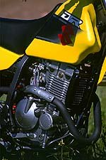 2001 suzuki dr z250 motorcycle com, Though not particularly spunky the Suzuki s 249 cc motor makes decent controllable power