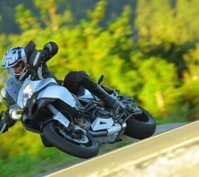 2013 ducati multistrada 1200 s touring review motorcycle com, The Mulistrada s somewhat odd appearance has become more mainstream over the years