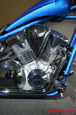 2010 honda fury unveiled motorcycle com, The Fury uses a newly fuel injected version of the VTX1300 motor A compact radiator sitting between the frame downtubes in front of the engine gives little clue to the assistance of liquid cooling