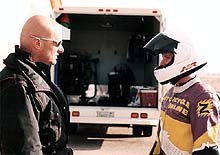 manufacturer 1999 600cc supersport shootout 15410, Managing Editor Mark Hammond and Plummer decide who will be to blame for the missing van door