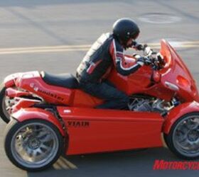 2008 gg quadster review motorcycle com, While the Quadster might not be a primary choice for a touring machine accommodations are spacious and luxurious The cylinders of the forward canted K1200 cylinders can be seen ahead of Duke s knee