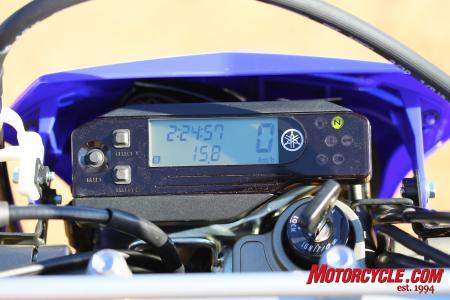2011 yamaha wr250r review motorcycle com, Sparse instrumentation includes trip speed clock and stopwatch info but could benefit from a fuel gauge and tach