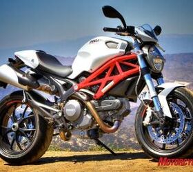 2010 triumph street triple r vs 2011 ducati monster 796 shootout motorcycle com, Ducati s all new Monster 796 The midsize Monster is possibly the best combo of what the Monster 696 and 1100 offer but is the 796 Monster enough to take on the formidable Street Triple R