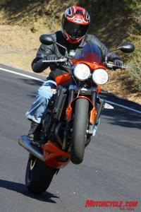 2010 triumph street triple r vs 2011 ducati monster 796 shootout motorcycle com, Excelling at hooliganism