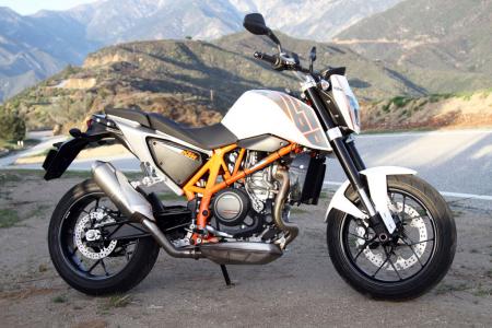 2013 ktm 690 duke review video motorcycle com, KTM s 690 Duke brings a distinctive option to the sportbike table There s nothing else quite like it