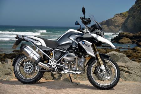 2013 bmw r1200gs review video motorcycle com, All new from the tires up BMW s new R1200GS is poised to reset the adventure touring bar The protective crash bars seen on this bike are optional extras