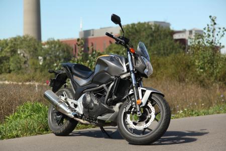 motorcycle beginner year 2 2013 honda nc700s review, The NC700S naked standard shares most of its components with the NC700X and is priced 200 lower than its adventure bike sibling