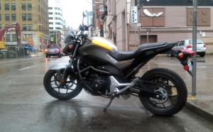 motorcycle beginner year 2 2013 honda nc700s review, We re pleased to report that the storage compartment stayed dry even in a heavy downpour