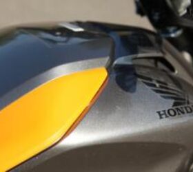 motorcycle beginner year 2 2013 honda nc700s review, We appreciated the capacious storage area under the faux fuel tank but its appearance would be more attractive if its lid would fit flush against its seam