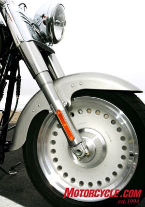 2007 harley davidson softail fat boy review motorcycle com, The new bullet hole disc wheels add to the Fat Boy style