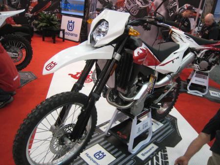 2010 indy dealer expo report, Husqvarna unveiled its new 600cc range of street legal bikes at Indy This is the TE630 dual sport We re told to expect big power and relative comfort from these finely finished overgrown dirt machines