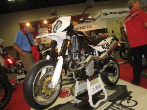 2010 indy dealer expo report, Husqvarna also pulled the wraps off its new street legal SMS630 a supermoto version of the new TE630 Its new DOHC engine is said to pump out 70 rear wheel horsepower when equipped with a performance exhaust system