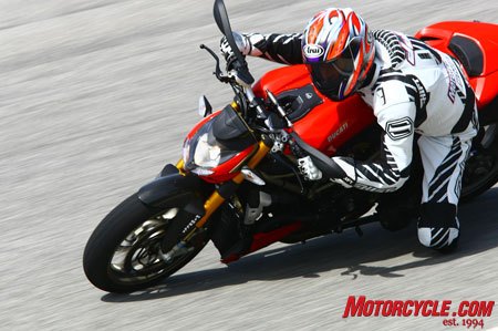 2009 ducati streetfighter review motorcycle com, The Streetfighter s relaxed chassis geometry pays dividends at racetrack speeds