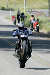 2007 kawasaki z1000 motorcycle com, Kawasaki staff in the background are perplexed asking themselves Is that Duke Danger I thought Pete was at this intro
