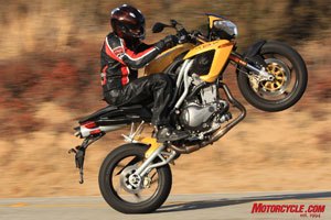 2009 streetfighter comparison 2010 ducati streetfighter vs 2008 benelli tnt 1130 , The Benelli s 1130cc in line Triple is equally as capable as the Streetfighter s big Twin when it comes to effortlessly hoisting the front