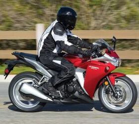 2011 honda cbr250r tech review motorcycle com, Family resemblance to the VFR1200F particularly for the red silver version is evident Honda says riders from 5 feet 4 inches tall up to 6 foot 2 fit well with maybe some room remaining on either extreme
