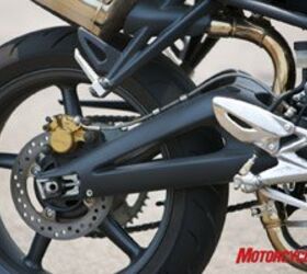 2008 triumph street triple 675 review motorcycle com, The frame and braced aluminum swingarm comes straight from the Daytona 675