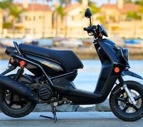 2012 yamaha zuma 125 review motorcycle com, A hacksaw will make quick work of the Zuma s unnecessary second rear fender and clean up the rear of the scooter For 2012 the Zuma 125 is also available in white