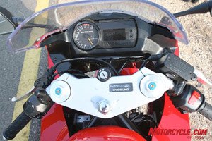 hyosung gt650r review motorcycle com, See what we mean by being not quite there The upper fork clamp is big enough to play a football match on