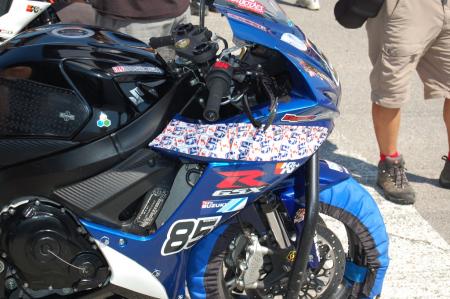 motorcycle beginner year 2 up close with canadian superbike racing, Raphael Archambault had a pair of second place finishes on this Suzuki GSX R600 The fairing includes a pattern made up of his 85 with the 8 colored with the Canadian flag and the 5 with Quebec s fleur de lis flag