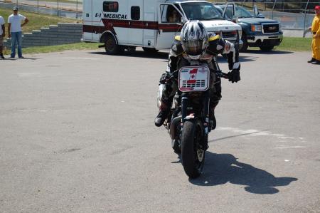 motorcycle beginner year 2 up close with canadian superbike racing, Steve Crevier celebrated his second straight XR1200 Cup title by leaving his mark on the asphalt on his way to the podium ceremony