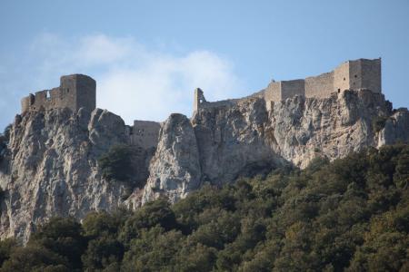 touring the south of france on a bmw r1200gs, Peyrepertuse built on a craggy ridge it is much larger than Montsegur