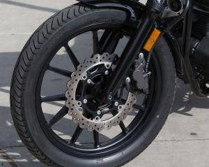 2014 star motorcycles bolt review motorcycle com, The Bolt delivers solid braking performance with large 298mm wave rotors front and rear nicely set off against the black 12 spoke cast wheels with a two piston caliper at the nose and a single piston gripper in the back