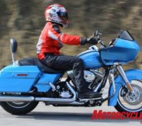 2011 kawasaki vulcan 1700 vaquero vs 2011 harley davidson road glide custom , Though maybe not readily apparent in this photo the Road Glide Custom s handlebar puts the rider in a slightly more forward position compared to the Vaquero s ergos