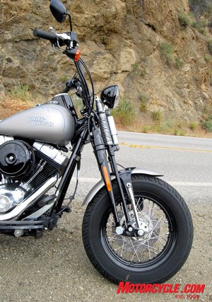 2008 harley davidson flstsb cross bones review motorcycle com, A chopped front fender keeps the eye focused on the fatty front rubber and springer suspension