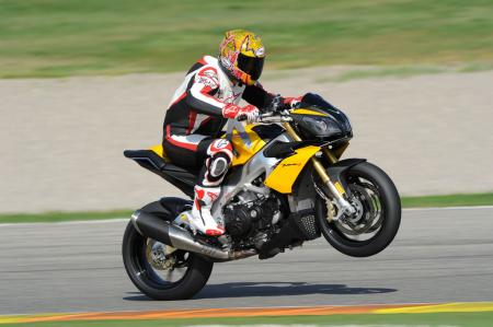 2011 aprilia tuono v4r aprc review motorcycle com, If you want to loft the front wheel skyward be sure to turn off the traction control