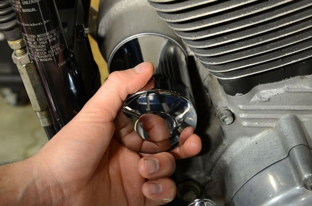 how to change oil in a harley davidson, Install the filter by hand tightening it to the mount