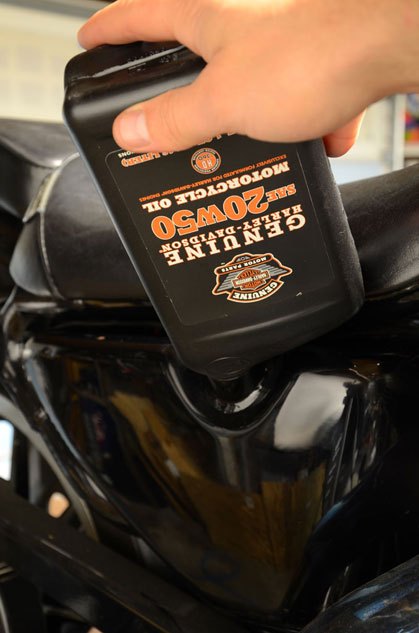 how to change oil in a harley davidson, Add the factory recommended type and amount of oil Sportsters require a little over three quarts of 20w50 oil