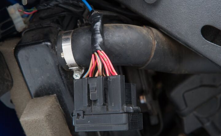turn on how to install switched accessory power to your motorcycle, Switched accessory power how to Wire harness and splice wrapped in electrical tape
