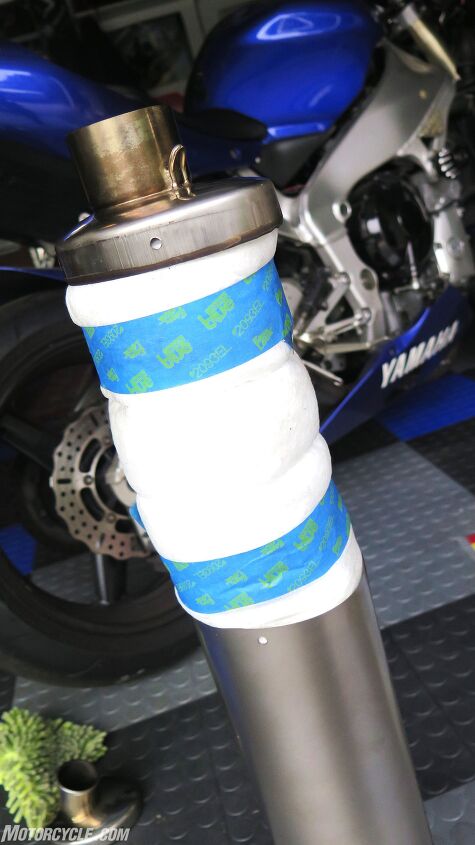 mo maintenance repack your muffler, Just wrap her around there like a diaper use a little masking tape to hold in place and shove it back into the canister