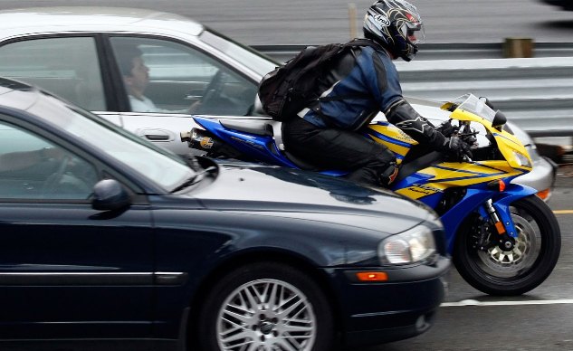 how to ride a motorcycle on the highway safely, It may sound counterintuitive initially but the best time to lane share is when two cars are side by side
