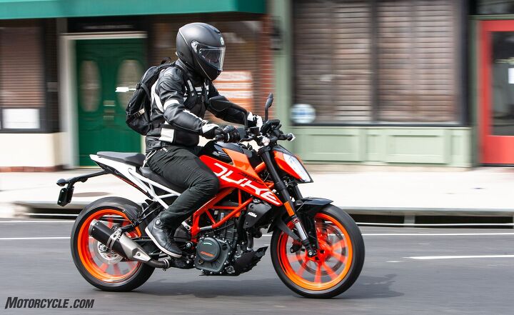 euro naked singles title bout, If I had to choose one machine to go into the battle of L A traffic the 390 Duke would be my weapon of choice I found the KTM s riding position more conducive when filtering through grid locked traffic