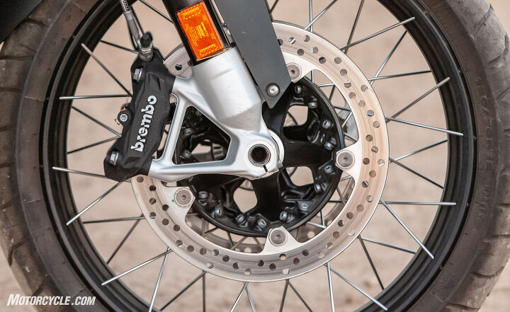 2018 big bore adventure touring shootout part 1 street, 642 pounds is a lot of moving weight and that s not counting you or what you put in the hard cases but when it s time to slow down you can rest assured thanks to a pair of four piston radially mounted Brembo binders and dual 305mm discs providing a great combination of bite and feel at the lever