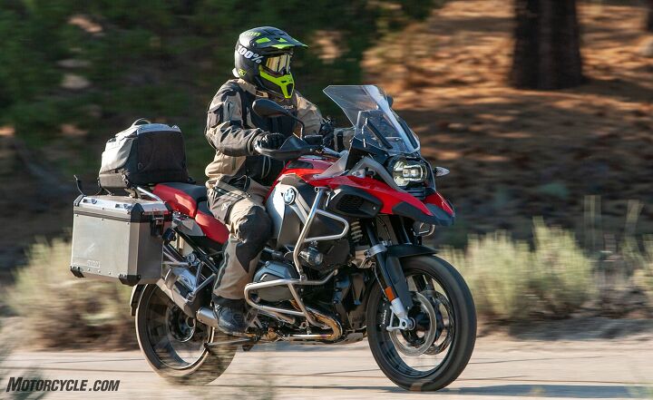 2018 big bore adventure touring shootout part 1 street, Of all the manufacturers to try their hand at the insectoid transformer styling exercise we think BMW nailed it When you see the mighty GS in your rearview mirror with its wide stance and cyclops headlight it looks menacing and says get outta my way And so you oblige