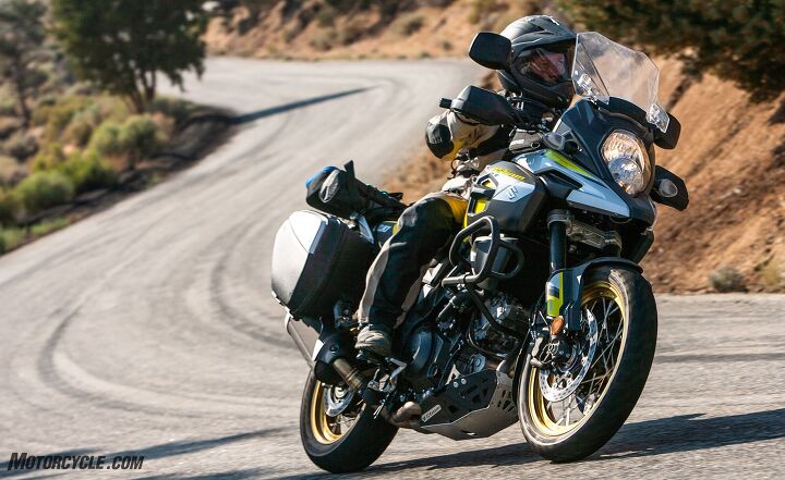 2018 big bore adventure touring shootout part 1 street, When it comes to bang for the buck the Suzuki V Strom 1000 XT is a home run Sorry Strom owners your secret s out