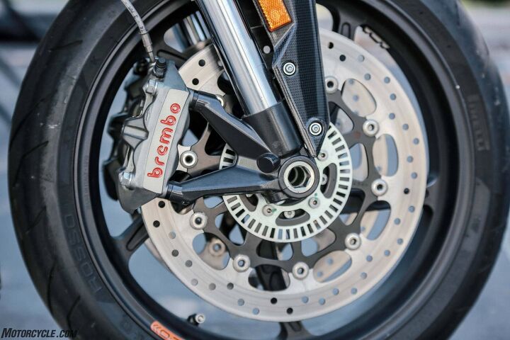 2020 electric motorcycle spec shootout, With a hefty 615 lbs to slow down the Eva can use all the brakes it can get Hence the 330mm discs and Brembo 4 pot radial mount calipers