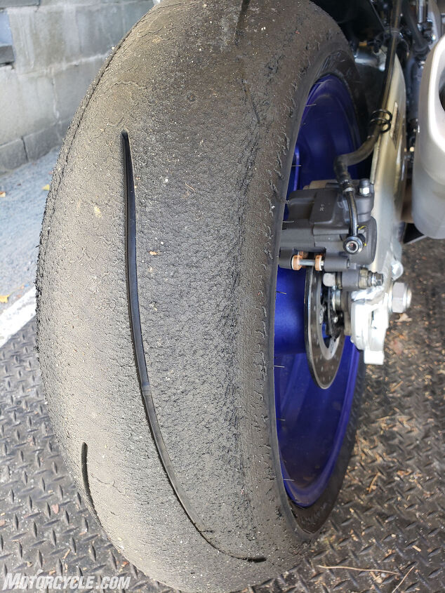 putting dunlops q5 trackday tire through the ultimate test, After one trackday at Buttonwillow the rear tire wear pattern looks pretty good but we re already getting close to the side wear bars