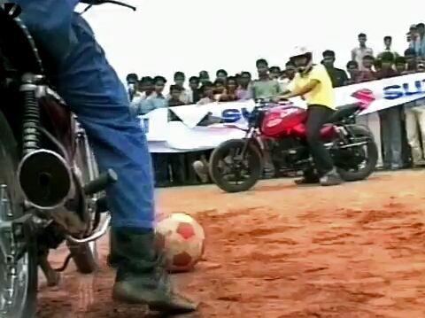 playing soccer on motorcycles video