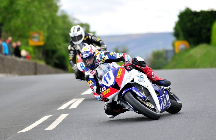 PACEMAKER BELFAST 09/06/11: Gary Johnson on his East Coast Racing Honda at Signpost on his way to his first TT win in the second Monster Energy Supersport race at the 2011 Isle of Man TT PHOTO SIMON PATTERSON
