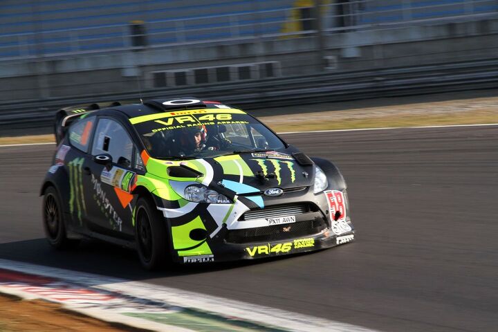 rossi finishes second to world champion loeb at monza rally show