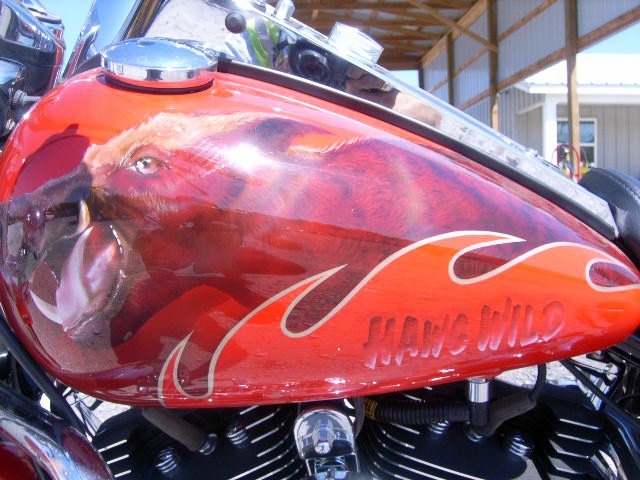 bobby petrino s harley davidson available for auction comes with baggage