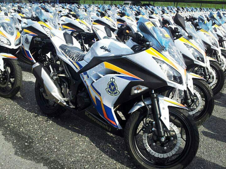 malaysian police launches fleet of 2013 kawasaki ninja 250 patrol bikes video