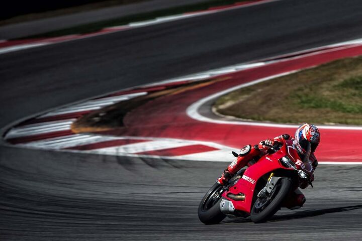 nicky hayden and ben spies ride the 2013 ducati 1199 panigale r at circuit of the