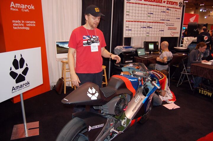 greg tracy to ride amarok p1a electric sportbike for pikes peak international hill, Michael Uhlarik and the Amarok P1A at the 2012 Toronto Motorcycle Show